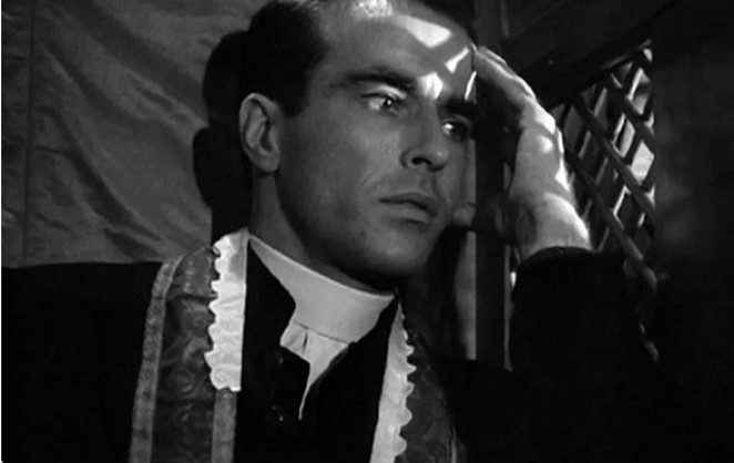 Montgomery Clift as Father Michael Logan