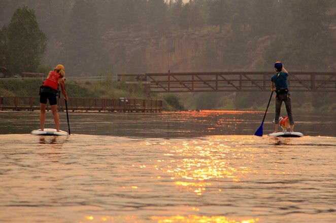 Enjoy a late day paddle on the Deschutes River set amid a sunset backdrop!