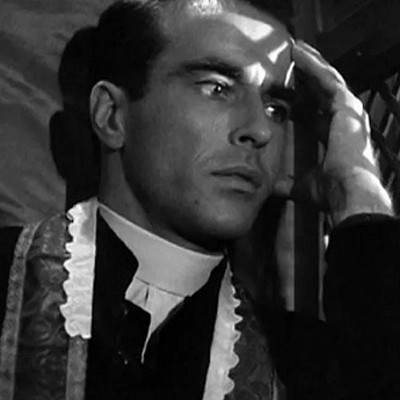 Montgomery Clift as Father Michael Logan