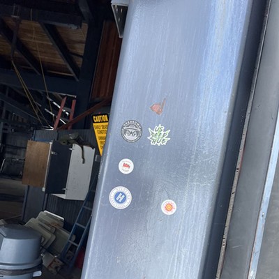Dispensary Stickers on Summit lift at Bachelor