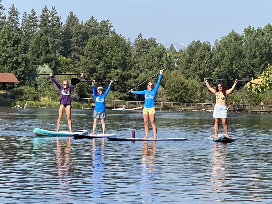 Ladies paddling on the river