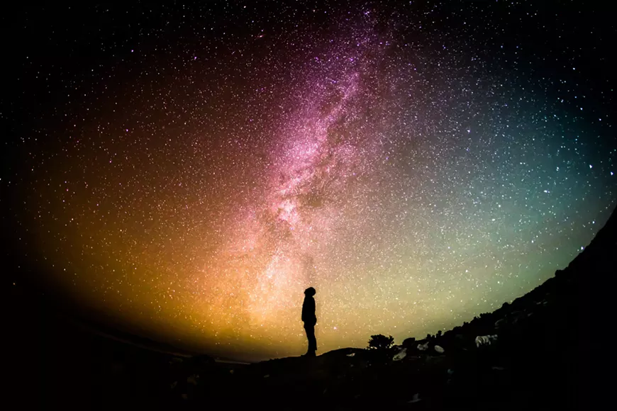 man_looking_at_stars.webp