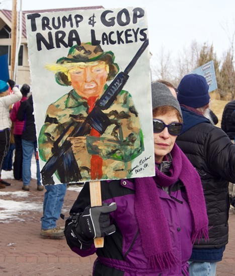 Protesters picket Trump, Walden, the NRA and the sale of public lands