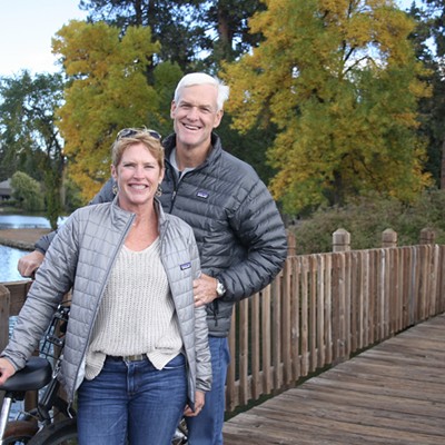A photo of me and my husband right after we purchased our home here in Bend October 2016 - stopping at Drake Park to take a photo while cycling around Bend.   🤣