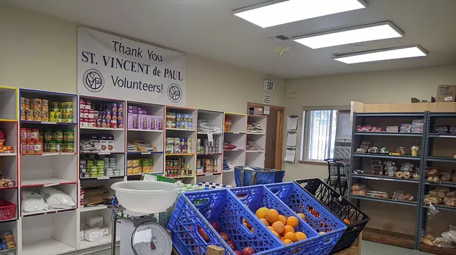 Image: Volunteer with St. Vinny's Food Pantry!