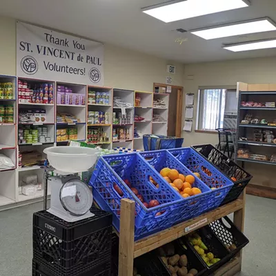 Image: Volunteer with St. Vinny's Food Pantry!